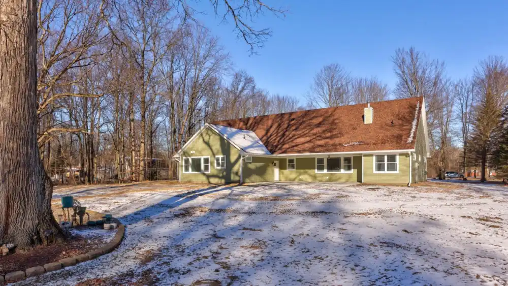 Partially built custom home representing fall construction trends in Burt, MI